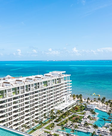 Luxurious view of Garza Blanca Cancun with pristine architecture and tropical surroundings
